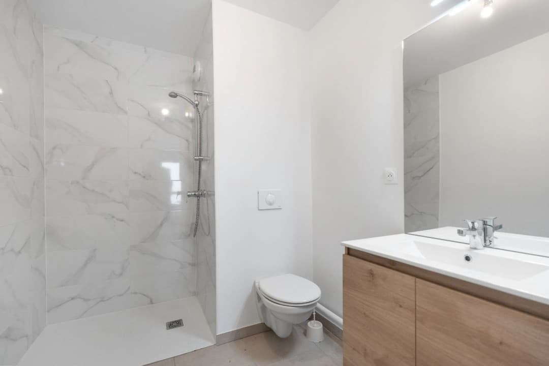 Villers-les-Nancy — Au cœur de Villers-lès-Nancy, cette nouvelle résidence s’intègre harmonieusement dans un parc boisé ... — Miniature 4